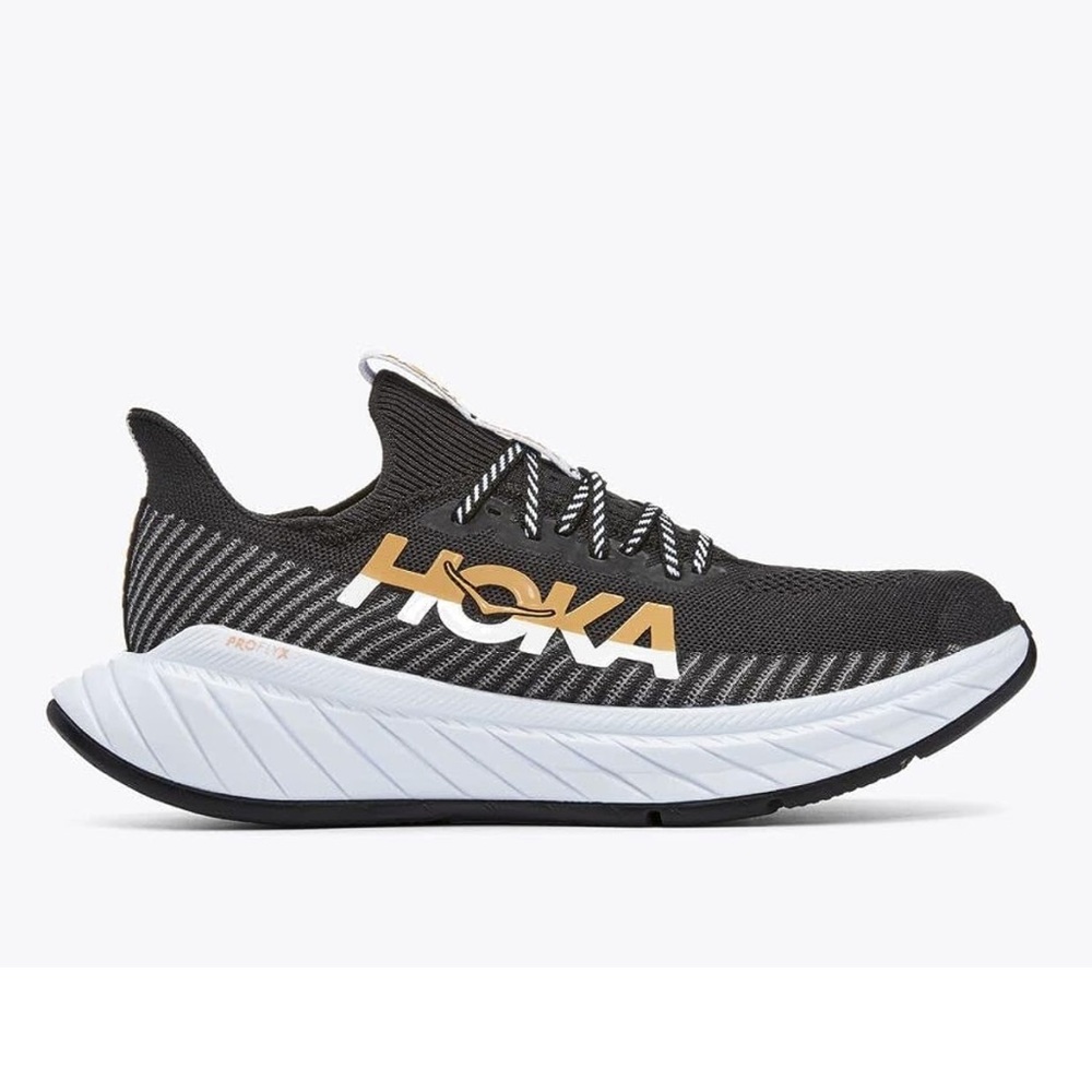 Black and white hoka women’s running shoes